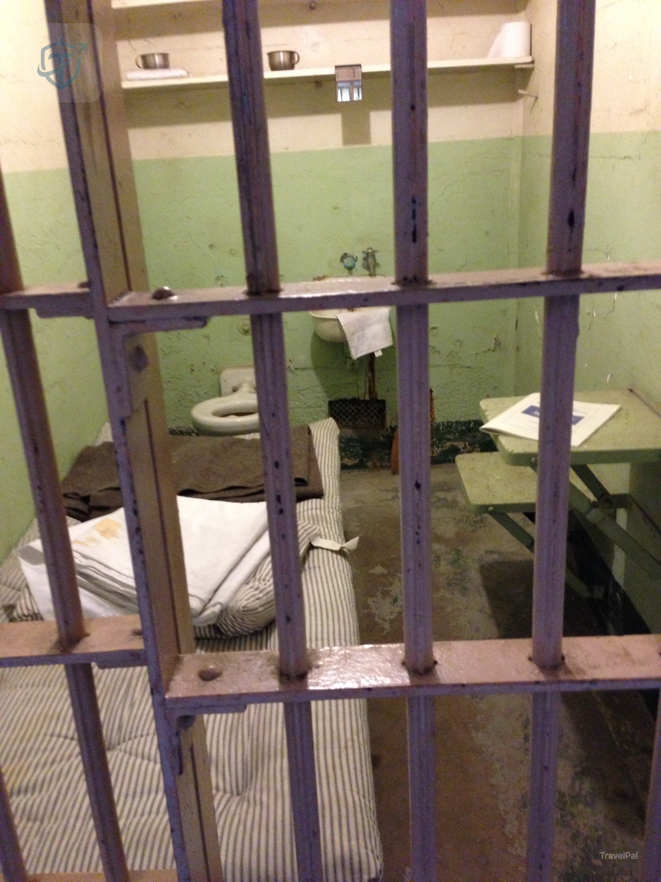 Cellhouse gallery with barred cells and exhibit displays