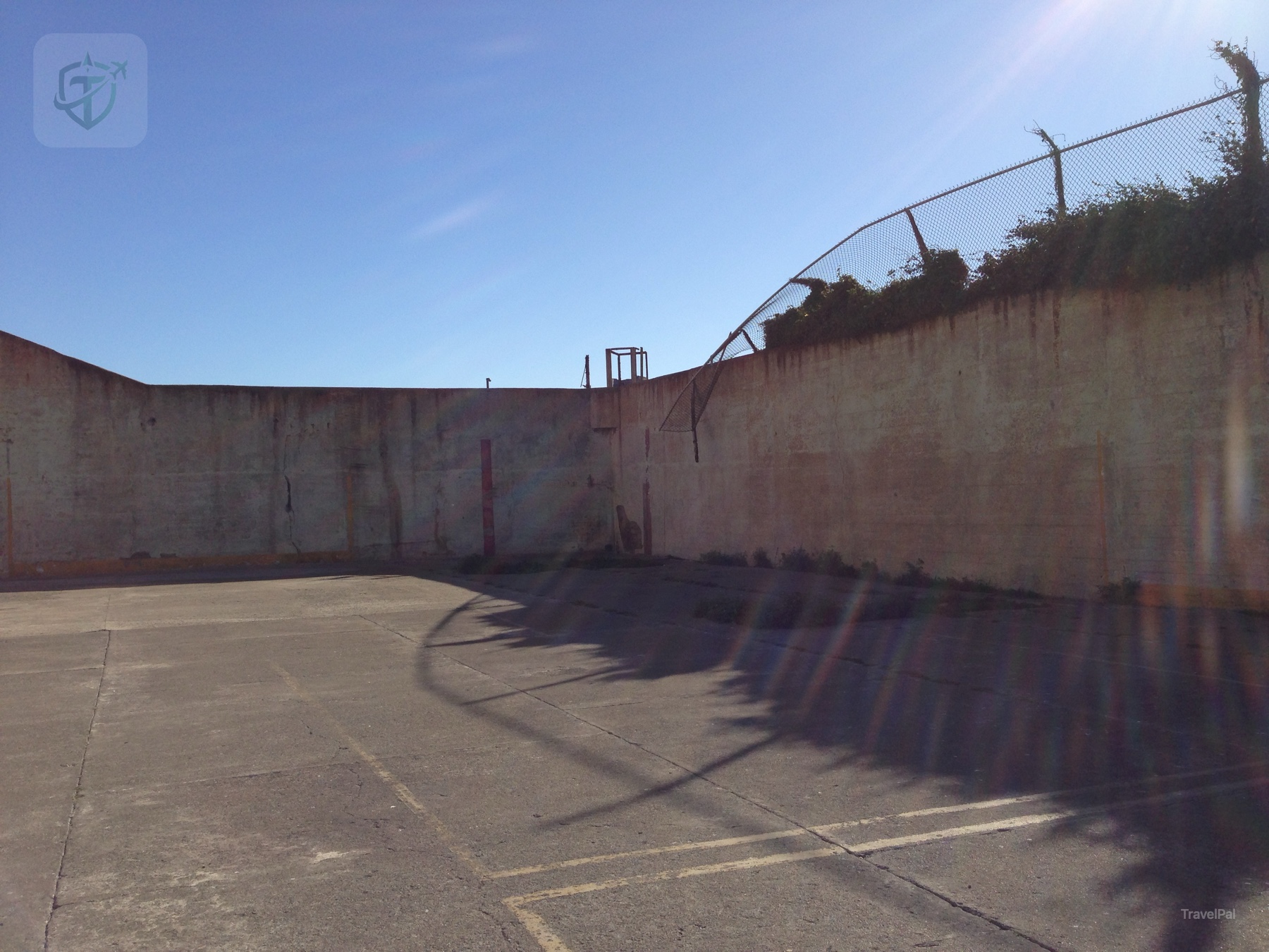 Alcatraz waterfront buildings and the cellhouse above the Bay
