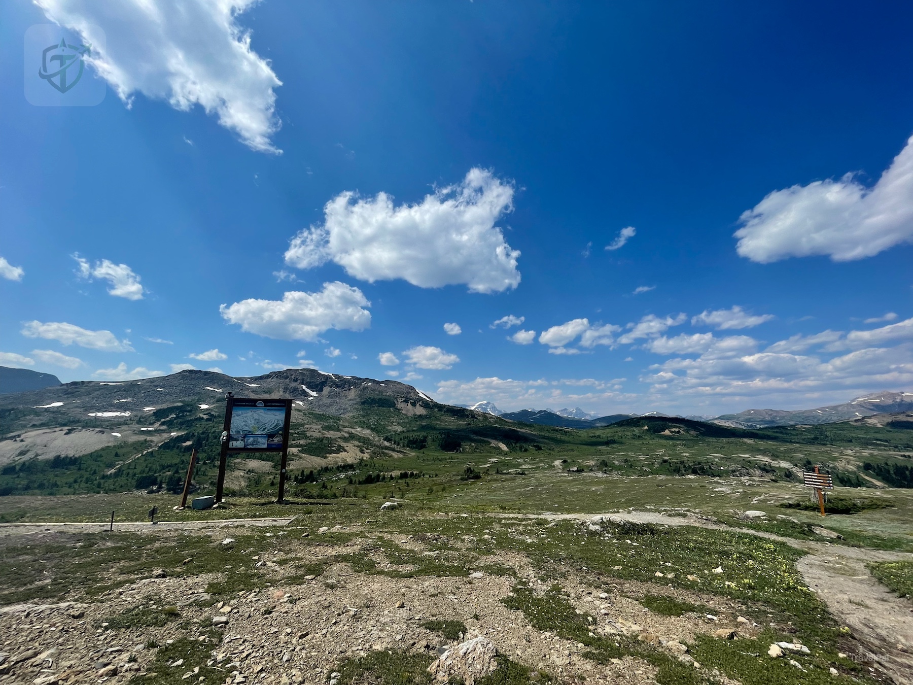 Open alpine plateau and distant Canadian Rockies viewed from Sunshine Meadows