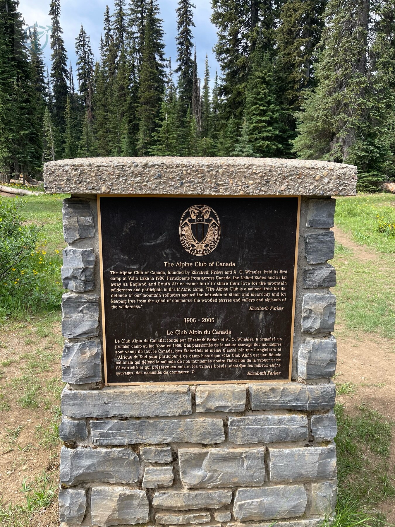 Stone memorial plaque for the Burgess Shale in a forest clearing