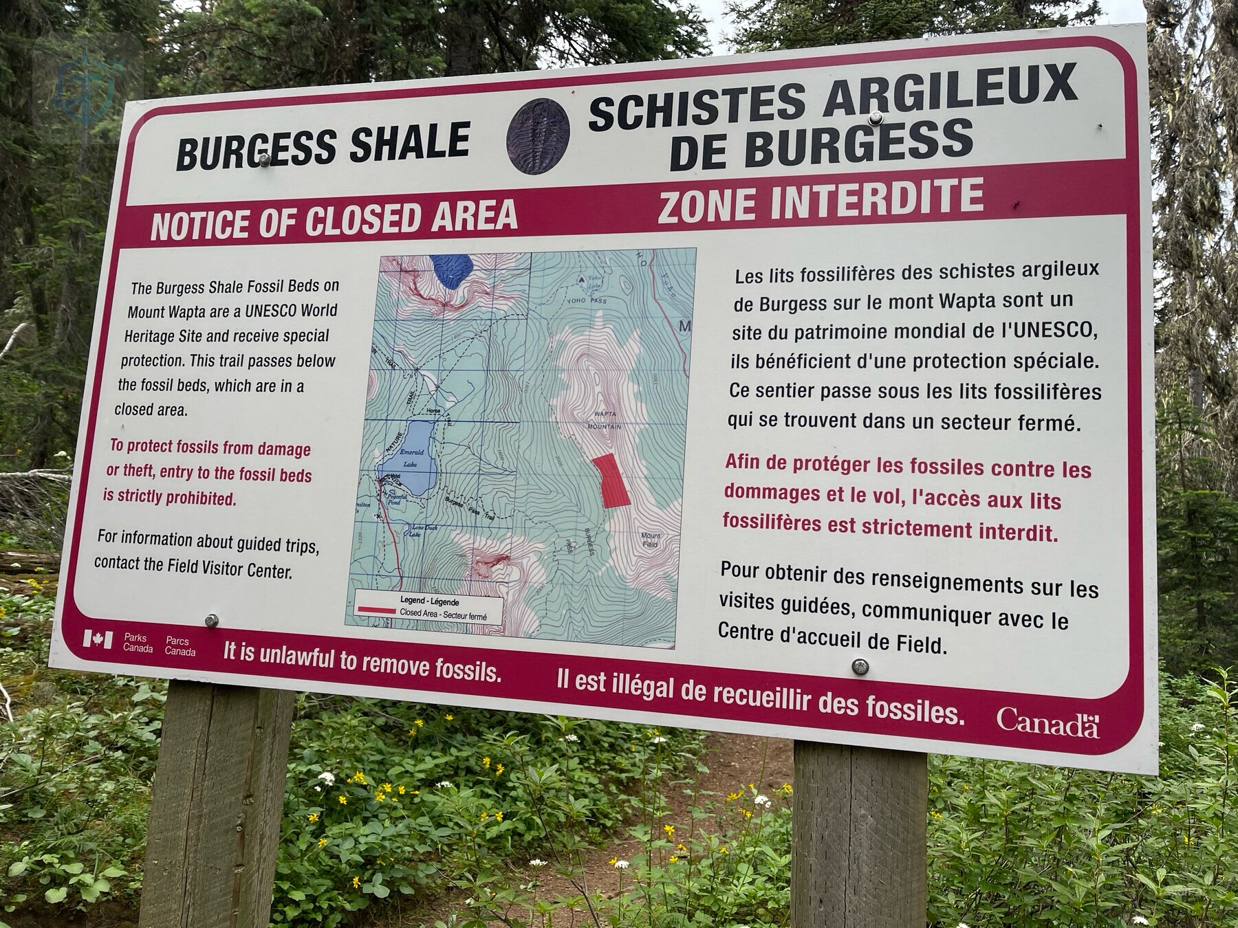 Bilingual Burgess Shale sign marking a closed and protected fossil zone