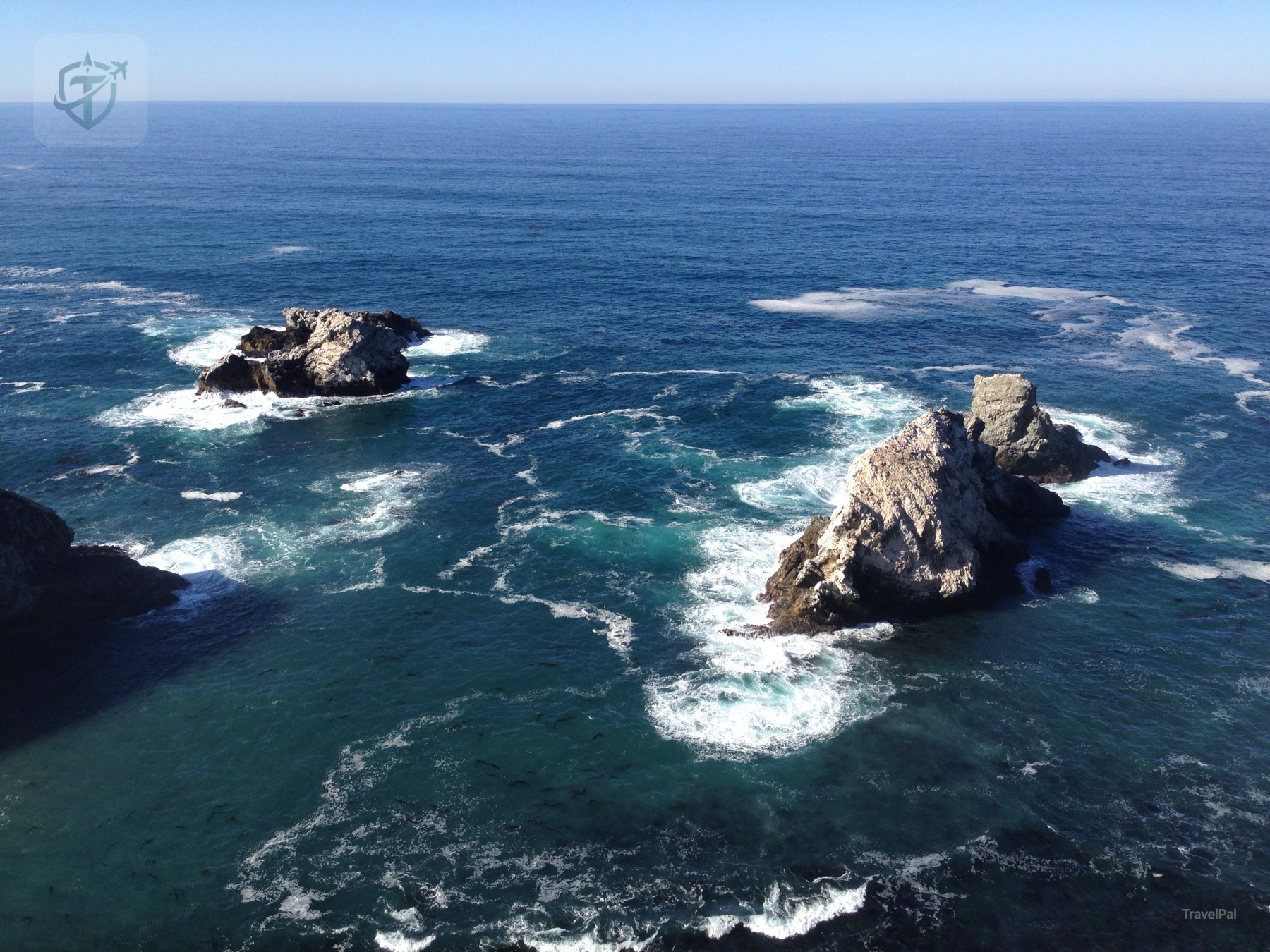 Sea stacks and white surf viewed from above on the Big Sur coast