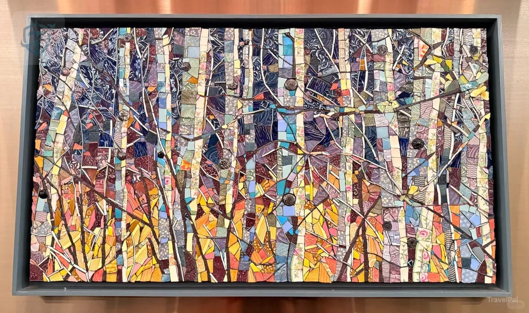 Colorful abstract birch forest artwork inside the MSP Delta Sky Club