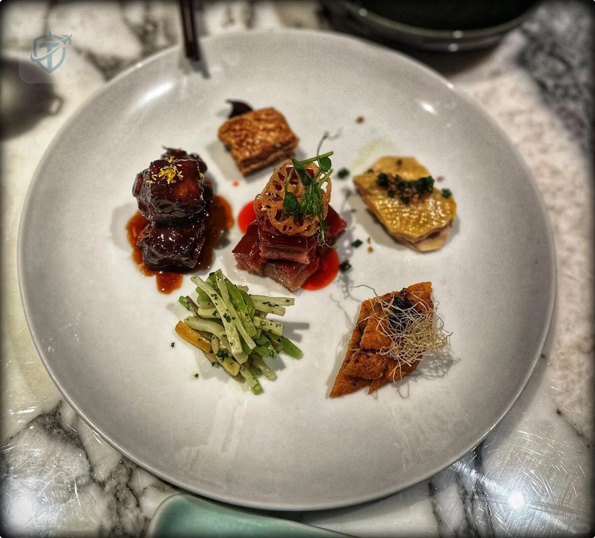 Plated Chinese dishes at 28 HuBin Road restaurant