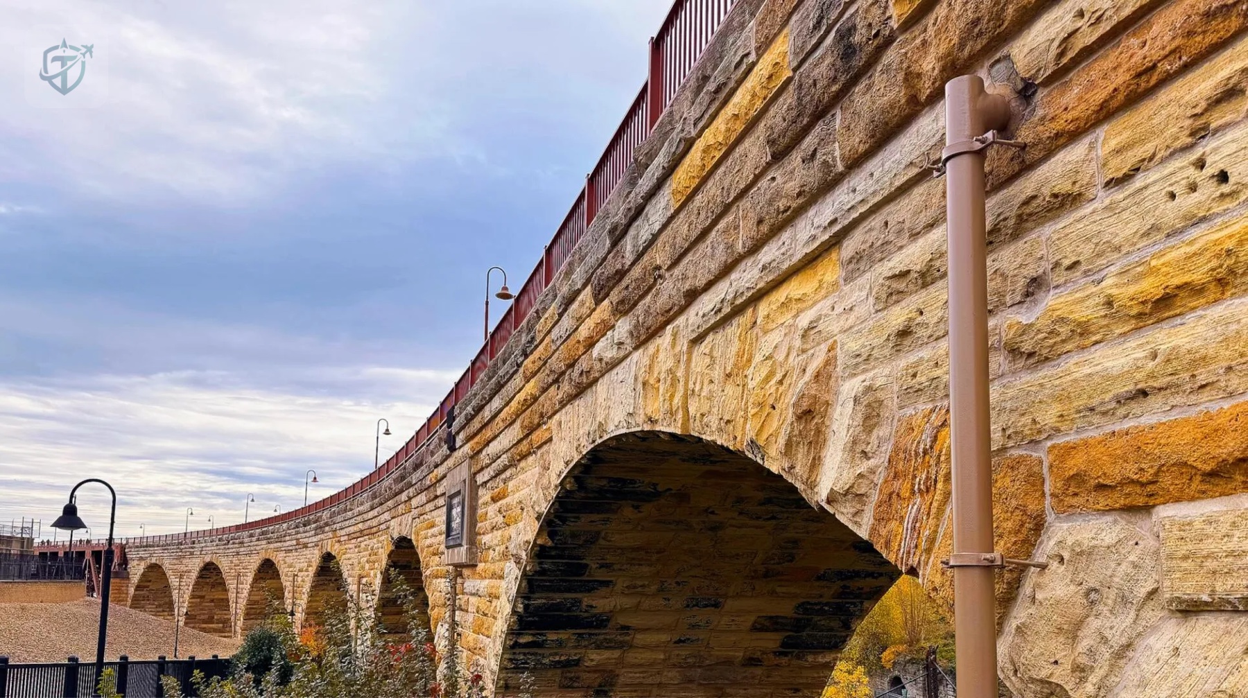Stone Arch Bridge curving across the Mississippi River in Minneapolis