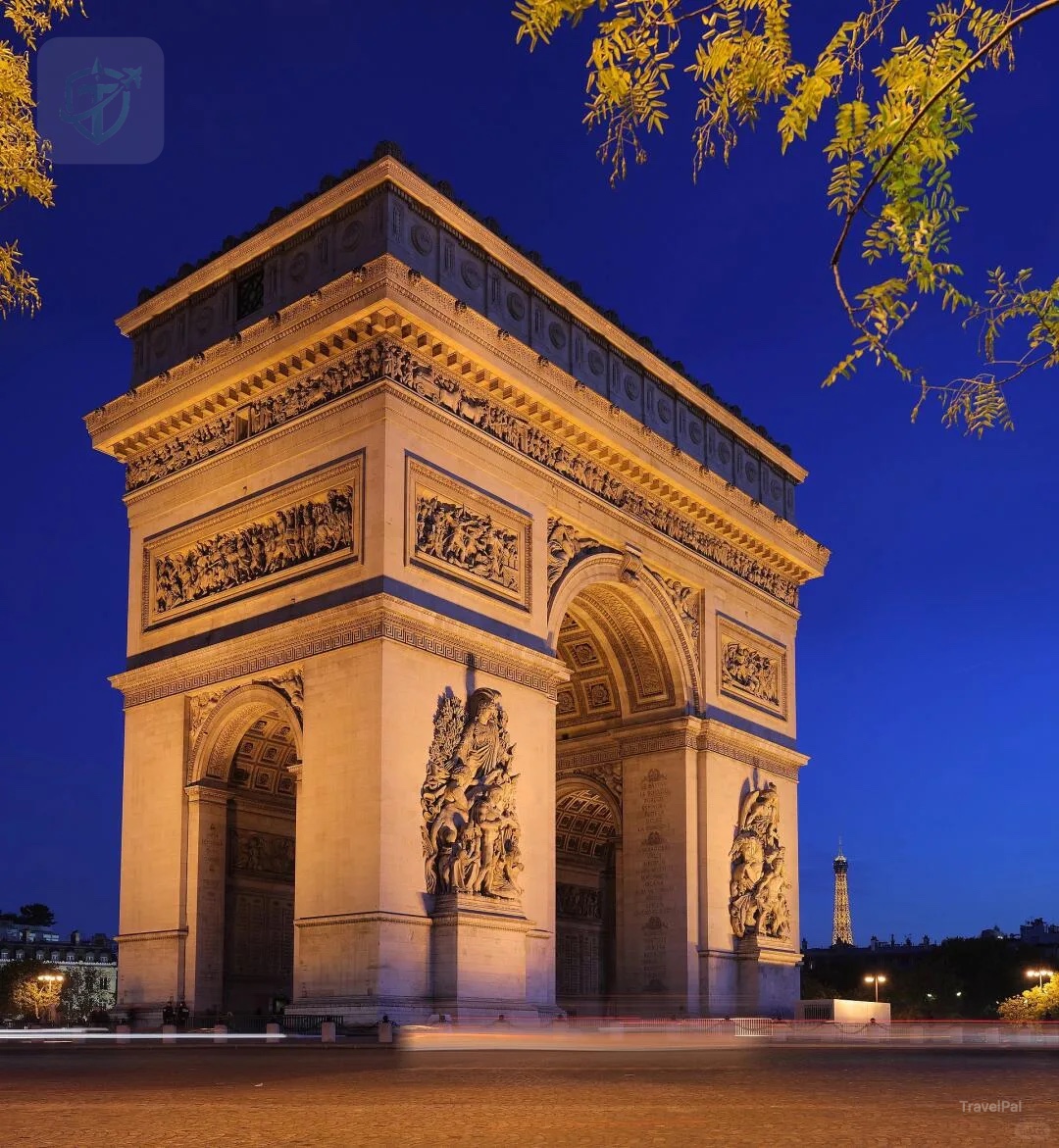 Arc de Triomphe illuminated at dusk