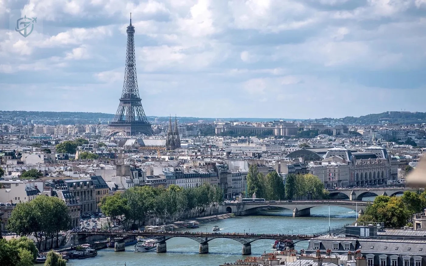 Eiffel Tower rising above the Paris skyline and Seine