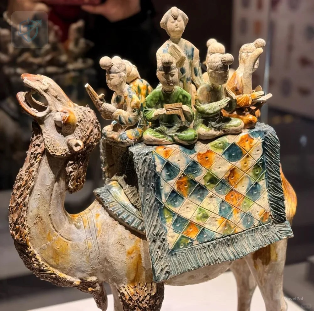 Tang sancai-glazed camel carrying a group of musicians and a singer