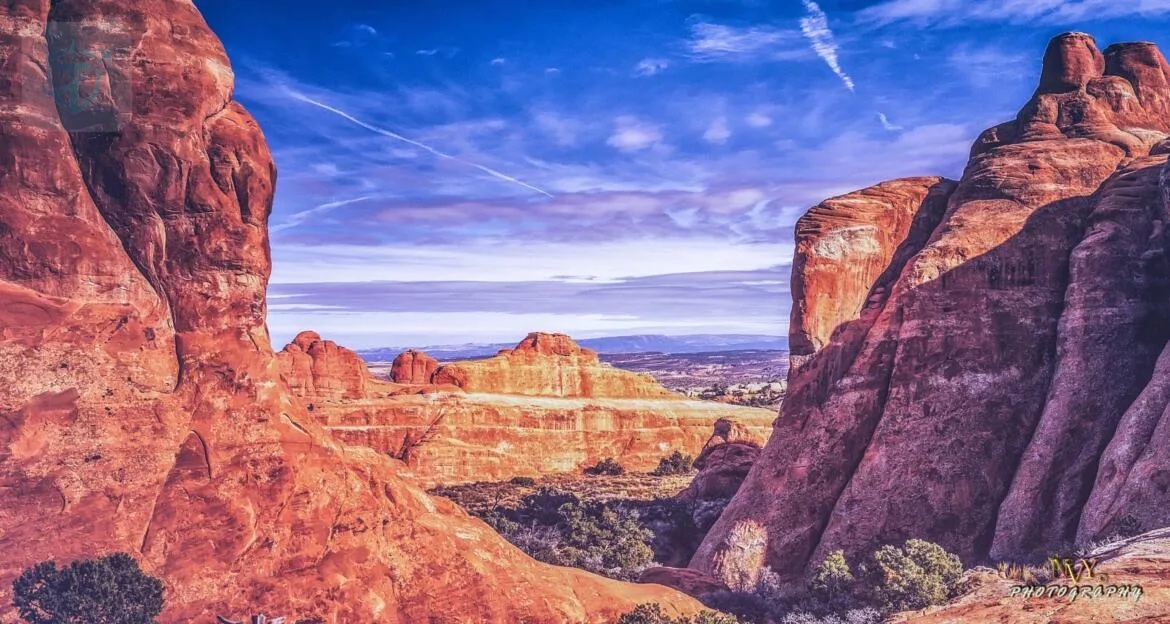 Red-rock canyon and natural arch landscape in Utah