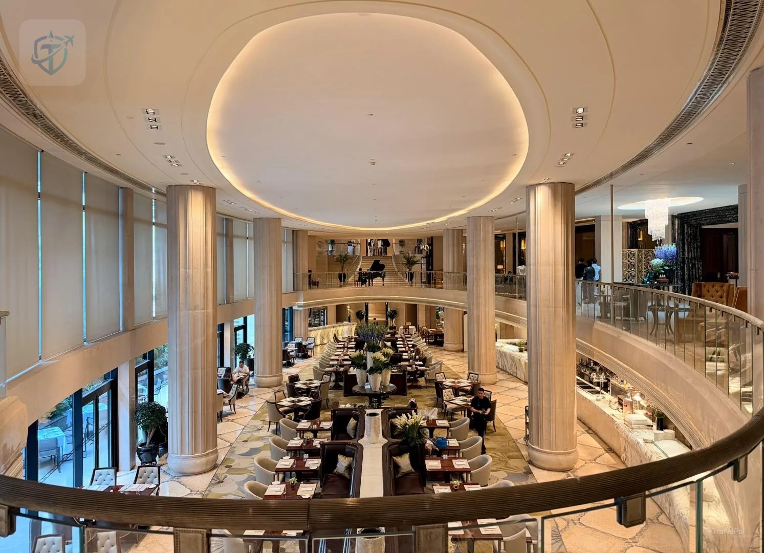 Elegant two-story Peacock Alley lounge at Waldorf Astoria Shanghai on the Bund